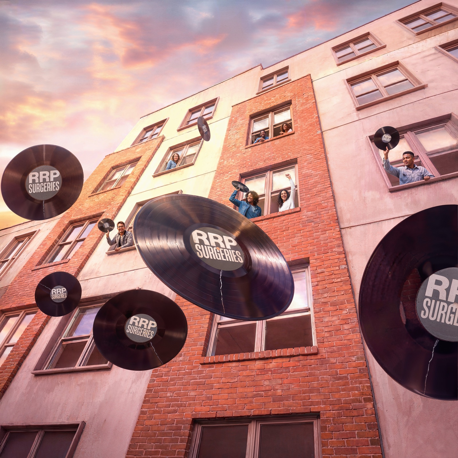 Half of a group of people throwing broken records of RRP surgery out of a building.