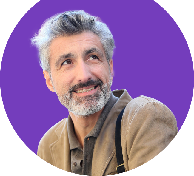 Man smiling looking up to the right